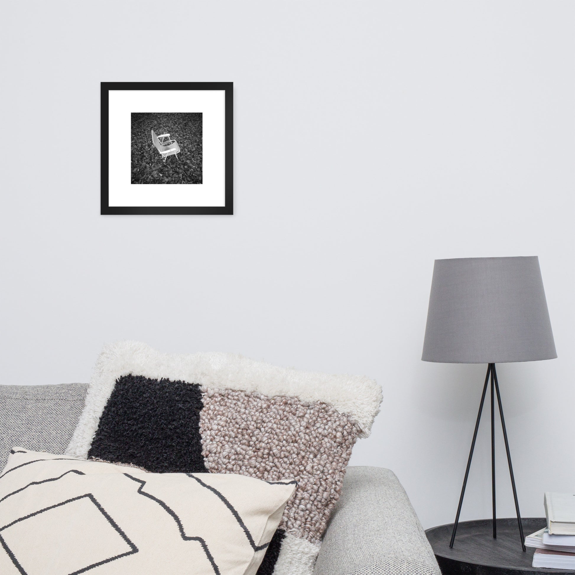 Fallen Leaves and Chair (B&W) Art – Framed Matte Paper Poster, Black Frame, Lifestyle View