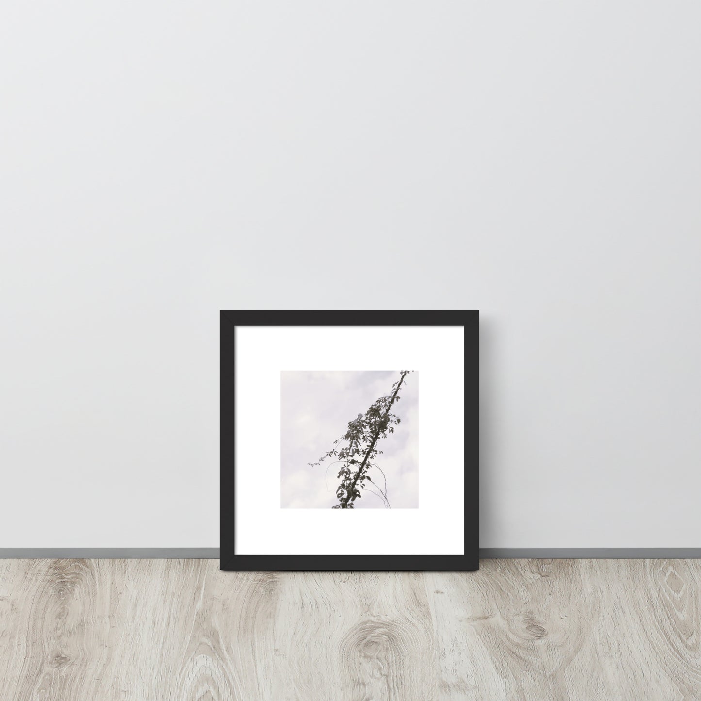 Minimalist mode style framed matte paper poster with a 'Vines Entangled on a Utility Pole' black and white photo print and a black frame / モードストリート系フレーム付きポスター（ブラックフレーム）、「電柱に絡まるツル」のモノクロ写真プリント（壁掛けアート）