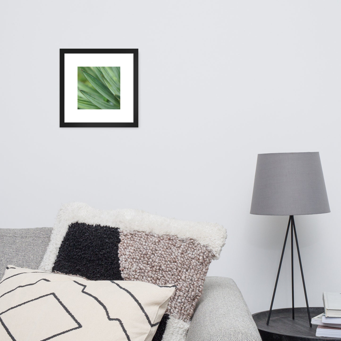 Minimalist streetwear style framed wall art in matte black, featuring a Yucca plant color photograph. Sleek, modern botanical decor for sophisticated living spaces. / モードストリート系・マットブラックフレーム入りユッカ植物のアートポスター。洗練された都会的なインテリアに最適なミニマリスト・デザイン。