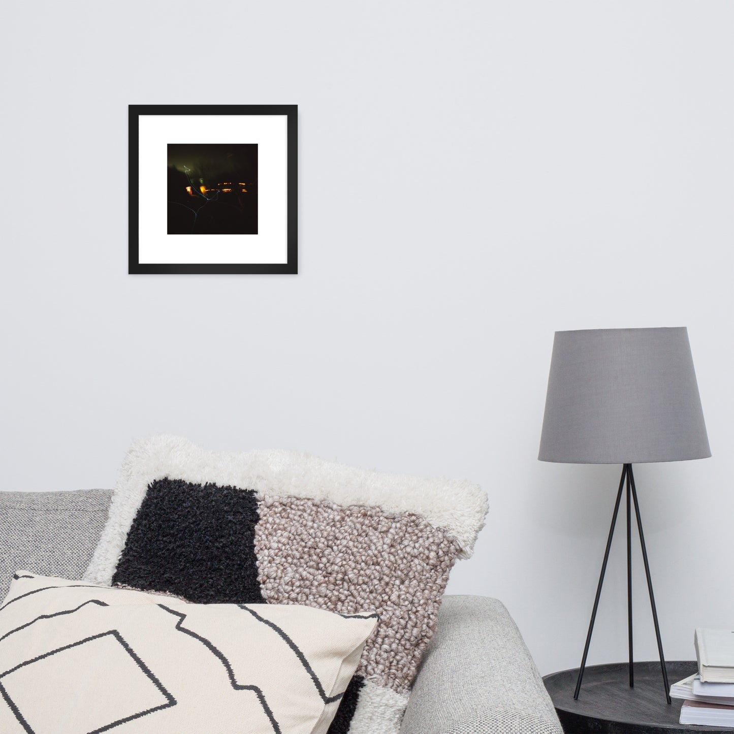 Minimalist streetwear style framed wall art in matte black, featuring a 'Night Light' photograph. / Night Light 額装ポスター（ブラックフレーム）：夜の光の幻想的な風景を捉えた写真。モードストリート系ミニマリスト・インテリアアート。