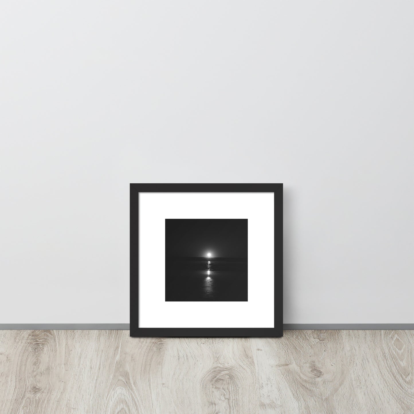 Minimalist streetwear style framed wall art in matte black, featuring the 'Ocean Sunbeams (B&W)' photograph. / 「Ocean Sunbeams (B&W)」額装ポスター（ブラックフレーム）：海面の光をモノクロで捉えた、モダンなミニマリスト・インテリアアート。