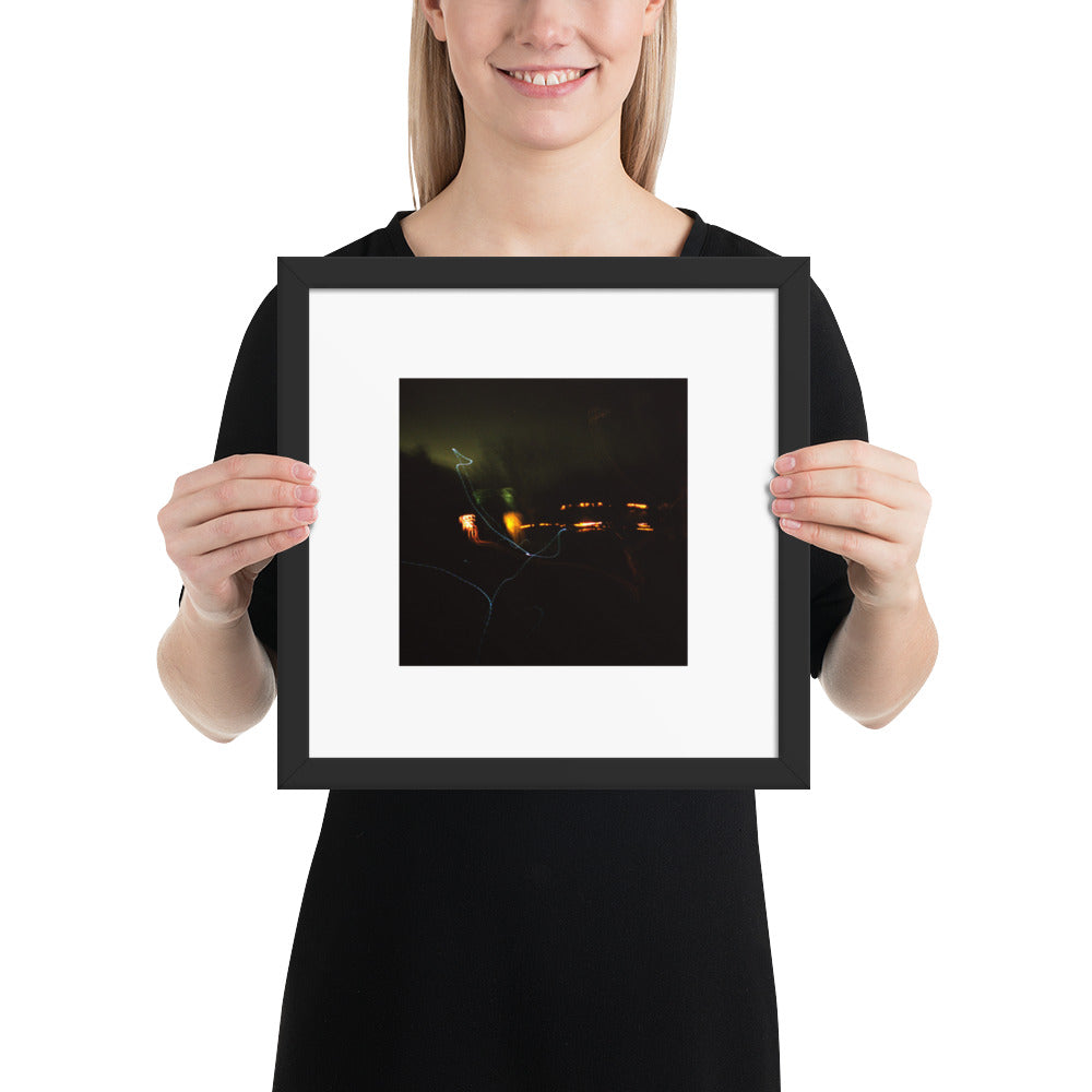 Minimalist streetwear style framed wall art in matte black, featuring a 'Night Light' photograph. / Night Light 額装ポスター（ブラックフレーム）：夜の光の幻想的な風景を捉えた写真。モードストリート系ミニマリスト・インテリアアート。