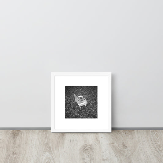 Fallen Leaves and Chair (B&W) Art – Framed Matte Paper Poster, White Frame, Lifestyle View