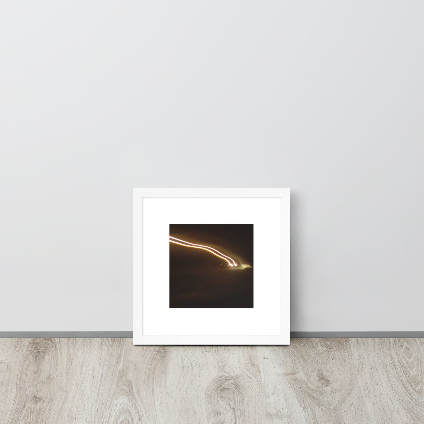 Minimalist streetwear style framed wall art in matte white, featuring a 'Night Car Lights' photograph. / Night Car Lights 額装ポスター（ホワイトフレーム）：クリーンな白枠がモダンな空間を演出する、都会的夜景のモードストリート系インテリアアート。