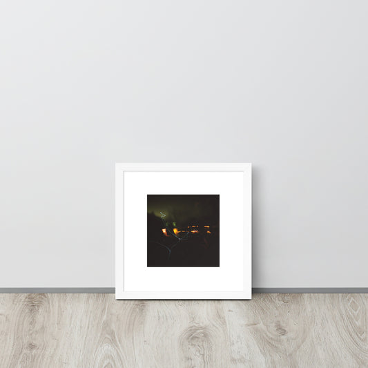 Minimalist streetwear style framed wall art in matte white, featuring a 'Night Light' photograph. / Night Light 額装ポスター（ホワイトフレーム）：クリーンな白枠がモダンな空間を演出する、夜の光の風景を捉えたモードストリート系インテリアアート。