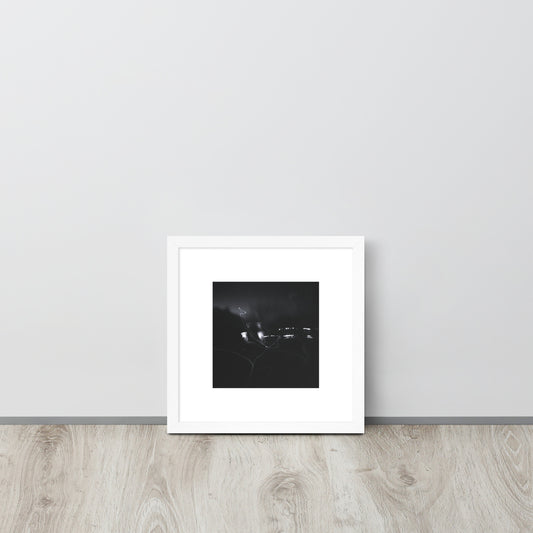 Minimalist streetwear style framed wall art in matte white, featuring a 'Night Light (B&W)' photograph. / Night Light (B&W) 額装ポスター（ホワイトフレーム）：クリーンな白枠がモダンな空間を演出する、夜の光のモノクロ風景を捉えたモードストリート系インテリアアート。