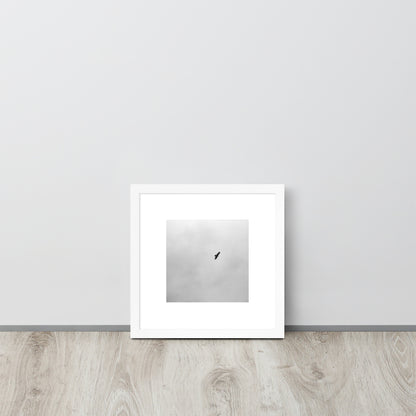 Minimalist streetwear style framed wall art in matte white, featuring a 'Bird and Sky (B&W)' photograph. / Bird and Sky (B&W) 額装ポスター（ホワイトフレーム）：クリーンな白枠がモダンな空間を演出する、空と鳥のモノクロ風景を捉えたモードストリート系インテリアアート。
