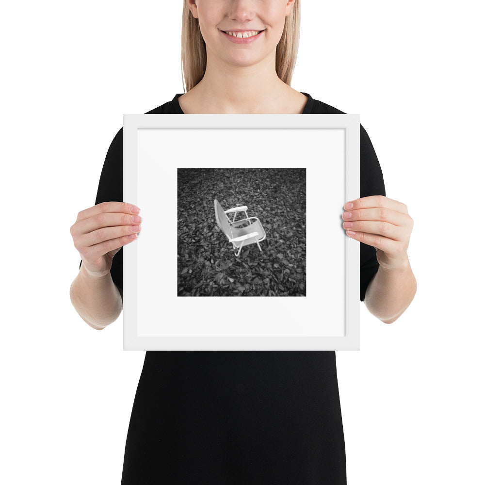 Fallen Leaves and Chair (B&W) Art – Framed Matte Paper Poster, White Frame, Lifestyle View