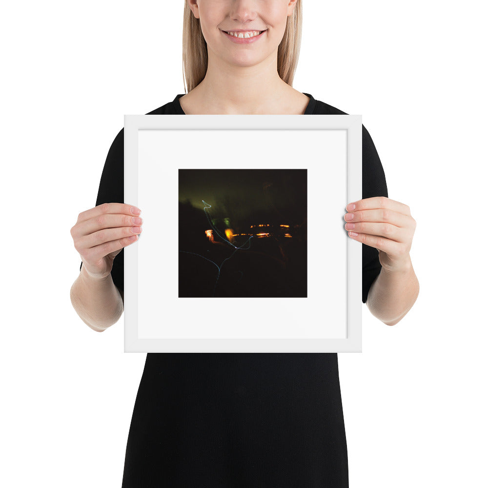 Minimalist streetwear style framed wall art in matte white, featuring a 'Night Light' photograph. / Night Light 額装ポスター（ホワイトフレーム）：クリーンな白枠がモダンな空間を演出する、夜の光の風景を捉えたモードストリート系インテリアアート。