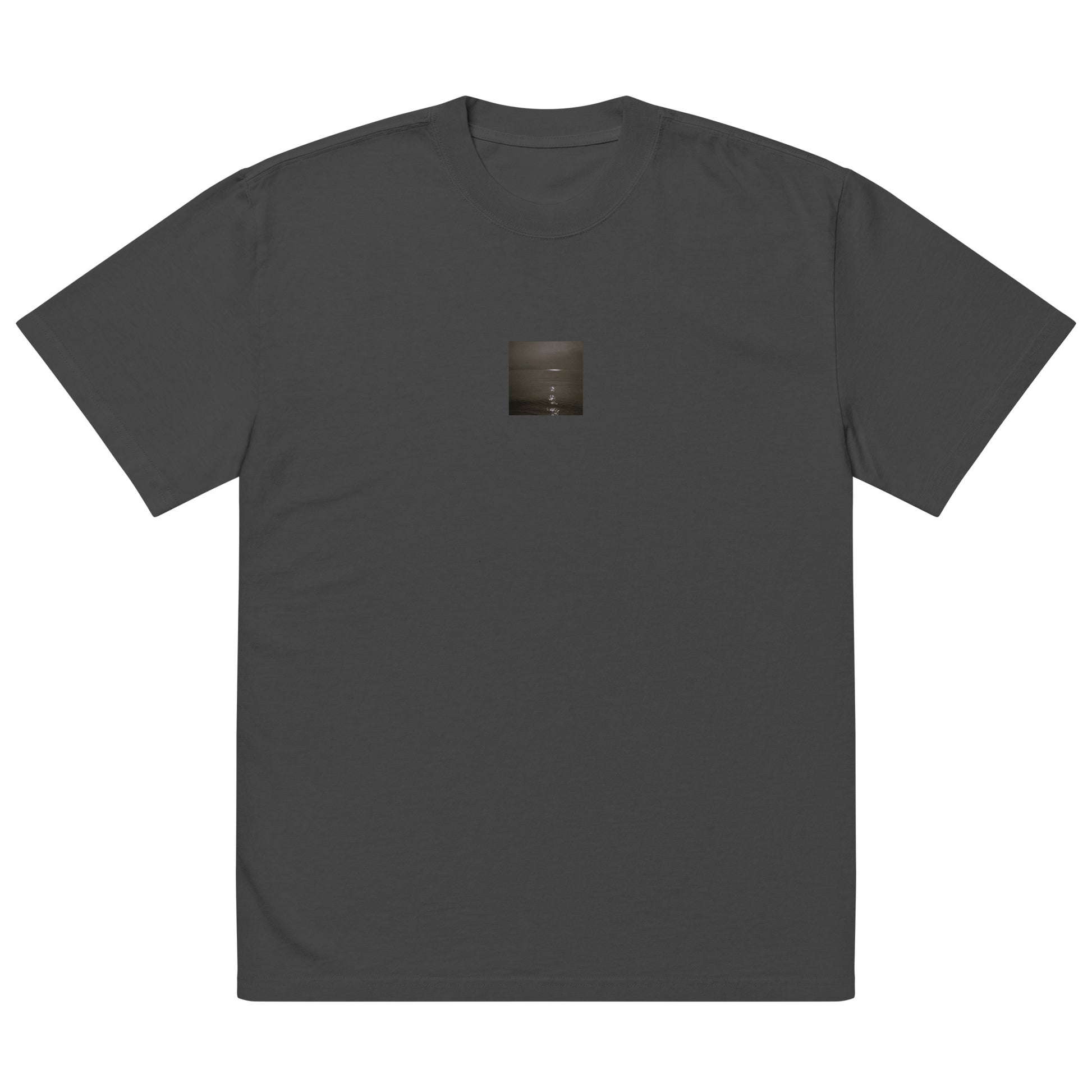 Minimalist streetwear style oversized faded T-shirt in black featuring the 'Sea and Sunshine (B&W)' photo art on the front. / モードストリート系オーバーサイズ・フェードTシャツ（ブラック）フロントに「海と太陽（モノクロ）」のフォトアートを配したデザイン。