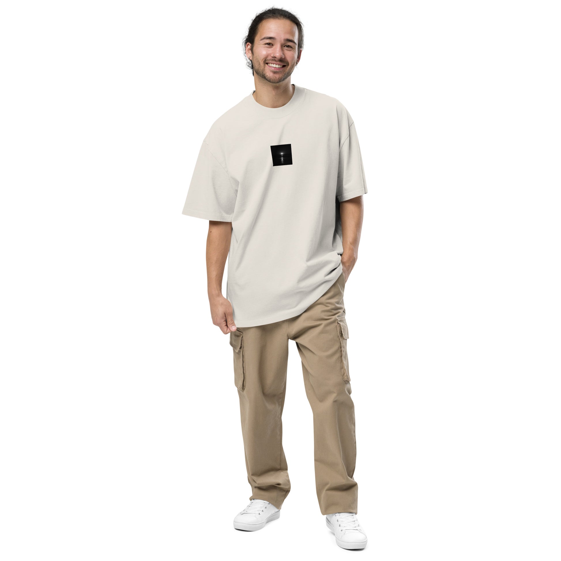 Minimalist streetwear style oversized faded T-shirt in faded bone, featuring the 'Ocean Sunbeams (B&W)' photograph. / 「Ocean Sunbeams (B&W)」オーバーサイズTシャツ（フェードボーン）：柔らかなオフホワイトにモノクロのコントラストが際立つ、清潔感のあるモードストリートTシャツ。