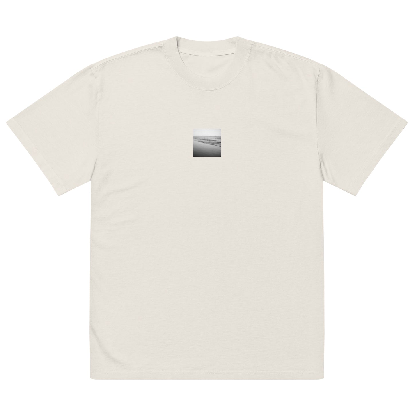 Minimalist streetwear style unisex oversized faded t-shirt in faded bone with 'Ocean Beach (B&W)' photo art print. / フロントに「オーシャン・ビーチ（モノクロ）」のフォトアートプリントを配した、モードストリート系オーバーサイズTシャツ（フェイデッド・ボーン）。