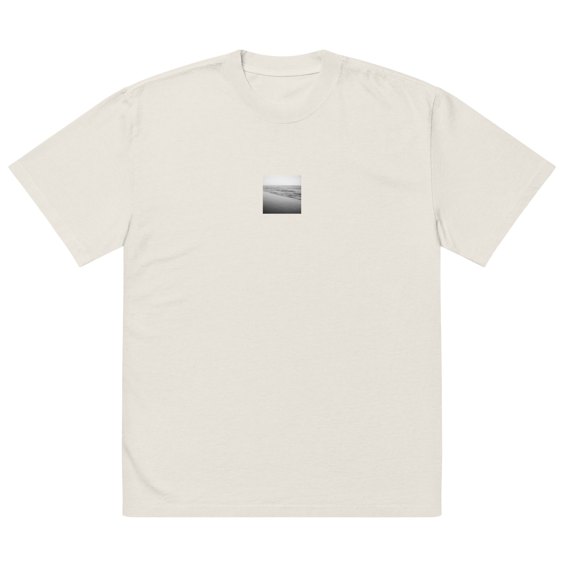 Minimalist streetwear style unisex oversized faded t-shirt in faded bone with 'Ocean Beach (B&W)' photo art print. / フロントに「オーシャン・ビーチ（モノクロ）」のフォトアートプリントを配した、モードストリート系オーバーサイズTシャツ（フェイデッド・ボーン）。