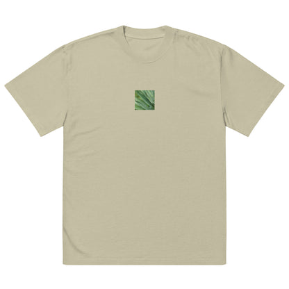 Minimalist streetwear style unisex oversized faded T-shirt in washed eucalyptus, featuring a vibrant Yucca plant color photograph on the chest. A clean, sophisticated aesthetic with a soft, lived-in feel. / モードストリート系ユニセックス・フェードユーカリプタス・オーバーサイズTシャツ。フロントにユッカ植物のカラー写真プリント。都会的で洗練された色合いのミニマリスト・ストリートウェア。