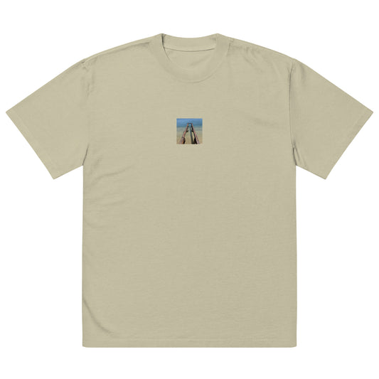 Minimalist streetwear style oversized faded T-shirt in eucalyptus featuring the 'Sea and Pier' photo art on the front. / モードストリート系オーバーサイズ・フェードTシャツ（ユーカリ）フロントに「海と桟橋」のフォトアートを配したデザイン。