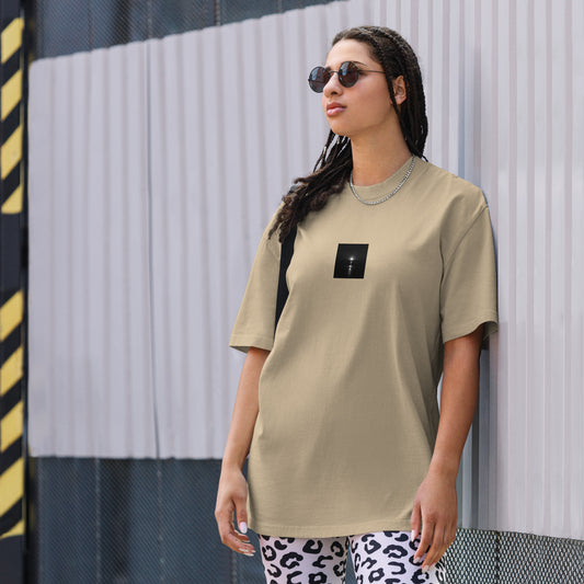 Minimalist streetwear style oversized faded T-shirt in faded khaki, featuring the 'Ocean Sunbeams (B&W)' photograph. / 「Ocean Sunbeams (B&W)」オーバーサイズTシャツ（フェードカーキ）：こなれ感のあるカーキにモノクロ写真が調和した、洗練されたミニマルデザイン。
