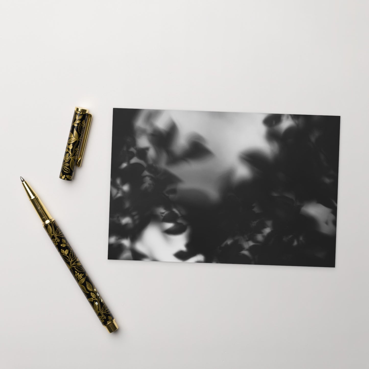 Minimalist streetwear style postcard featuring a 'Tree Branches' black and white photograph. Printed on thick, durable matte cardstock. / Tree Branches（木の枝）B&W ポストカード：モノクロの枝が際立つ、モードストリート系デザインのミニマリスト・ポストカード。厚手のマット紙を使用。