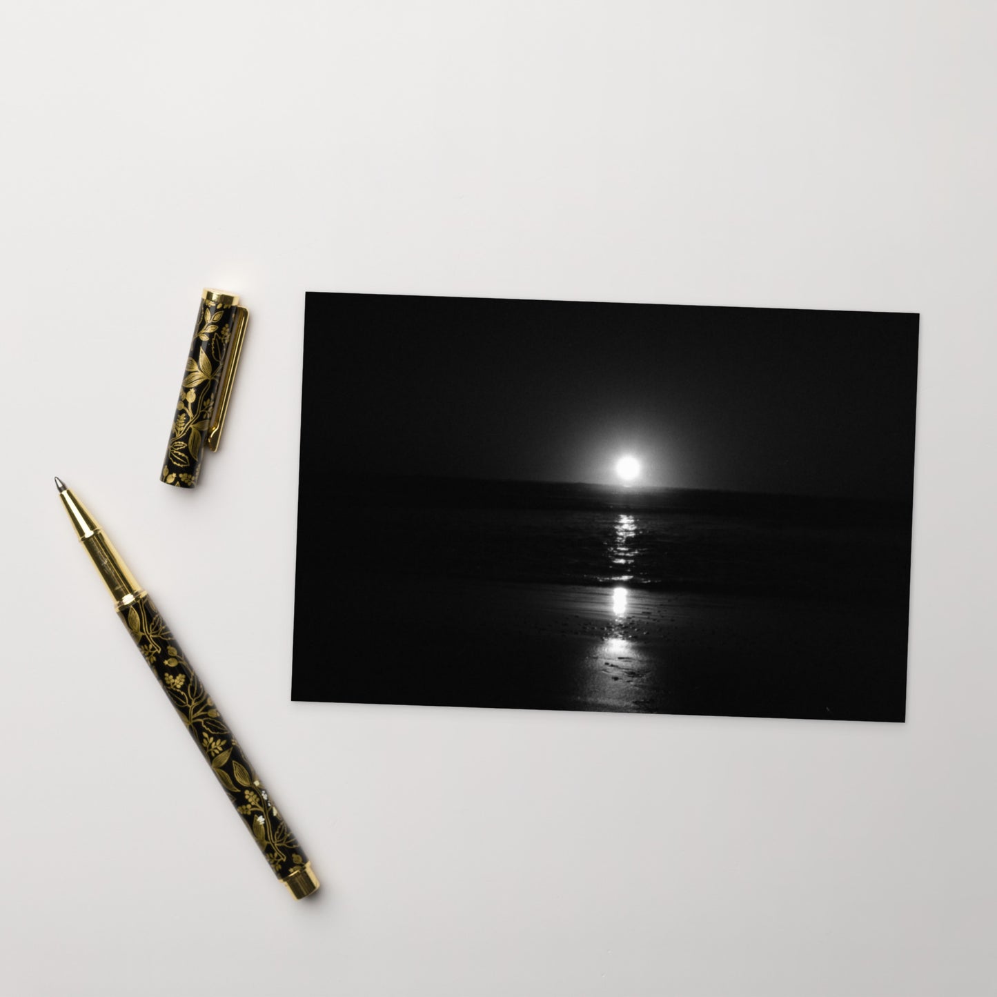 Minimalist postcard featuring the 'Ocean Sunbeams (B&W)' photograph, perfect as a greeting card or miniature art print. / 「Ocean Sunbeams (B&W)」ポストカード：海面に反射する光をモノクロで捉えた、洗練されたミニマルなデザインのアートポストカード。