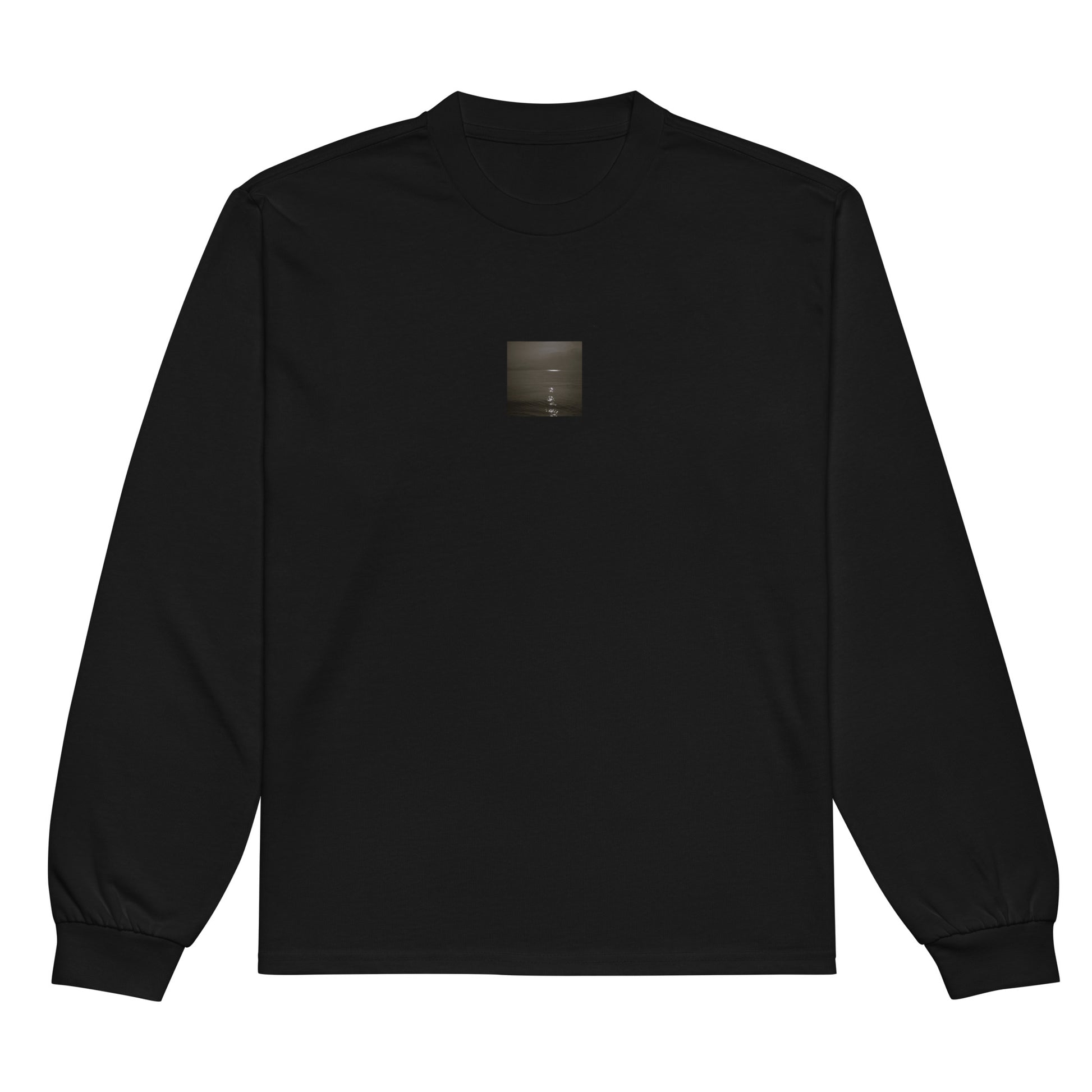 Minimalist streetwear style premium heavyweight long sleeve shirt in black featuring the 'Sea and Sunshine (B&W)' photo art on the front. / モードストリート系プレミアム・ヘビーウェイト長袖Tシャツ（ブラック）フロントに「海と太陽（モノクロ）」のフォトアートを配したデザイン。