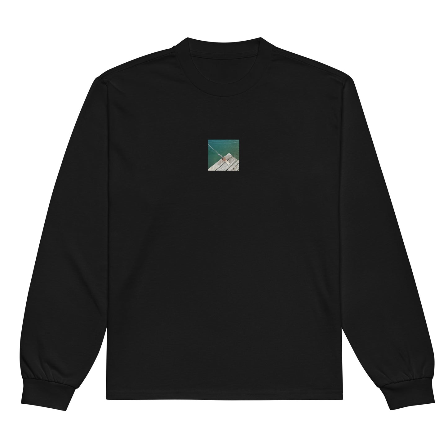 Minimalist streetwear style premium heavyweight long sleeve shirt in black featuring the 'Sea, Pier and Rope' photo art on the front. / モードストリート系プレミアム・ヘビーウェイト長袖Tシャツ（ブラック）フロントに「海、桟橋、ロープ」のフォトアートを配したデザイン。