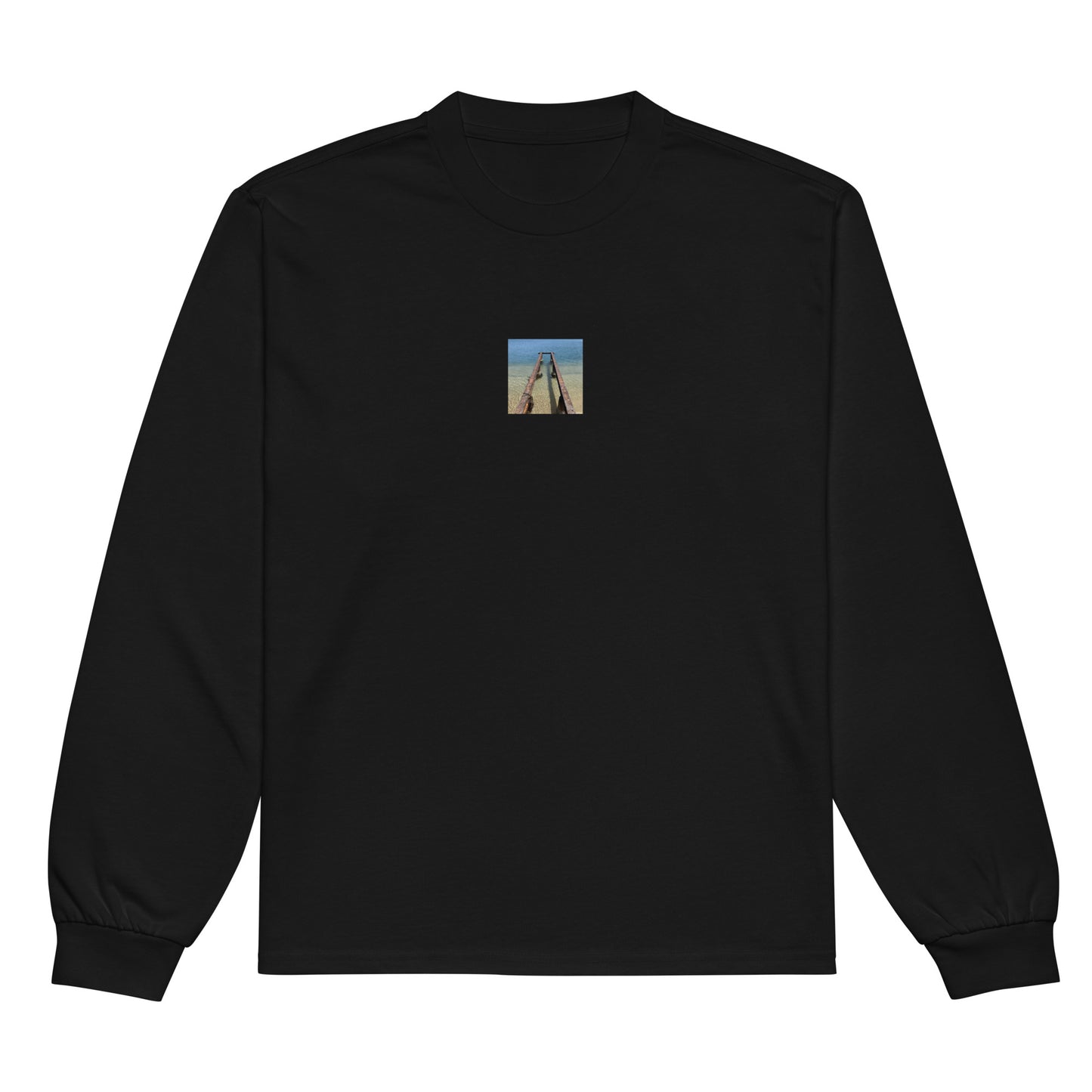 Minimalist streetwear style premium heavyweight long sleeve shirt in black featuring the 'Sea and Pier' photo art on the front. / モードストリート系プレミアム・ヘビーウェイト長袖Tシャツ（ブラック）フロントに「海と桟橋」のフォトアートを配したデザイン。