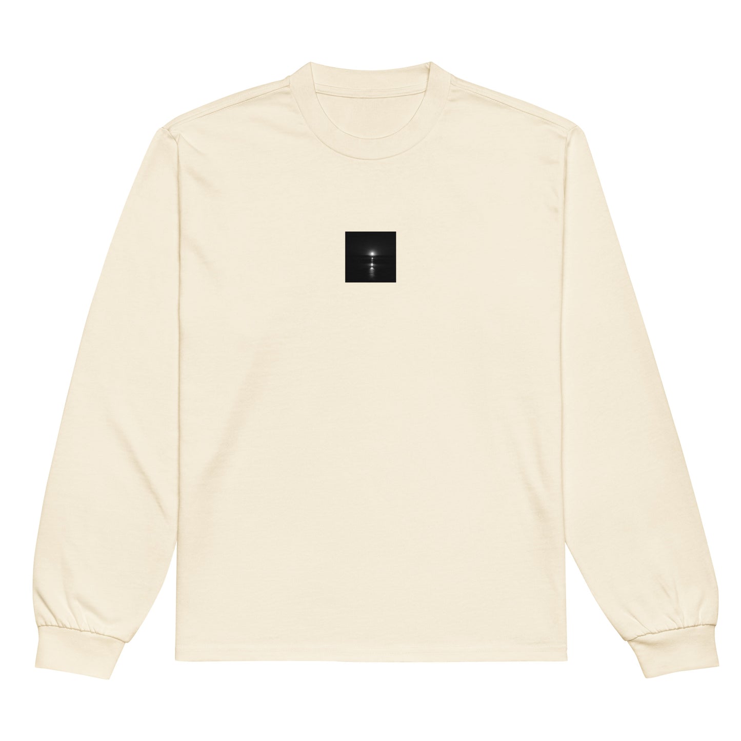 Minimalist streetwear style premium long sleeve shirt in ecru, featuring the 'Ocean Sunbeams (B&W)' photograph. / 「Ocean Sunbeams (B&W)」ロングスリーブTシャツ（エクリュ）：柔らかな生成り色にモノクロのアートが調和した、ミニマルで都会的なデザイン。