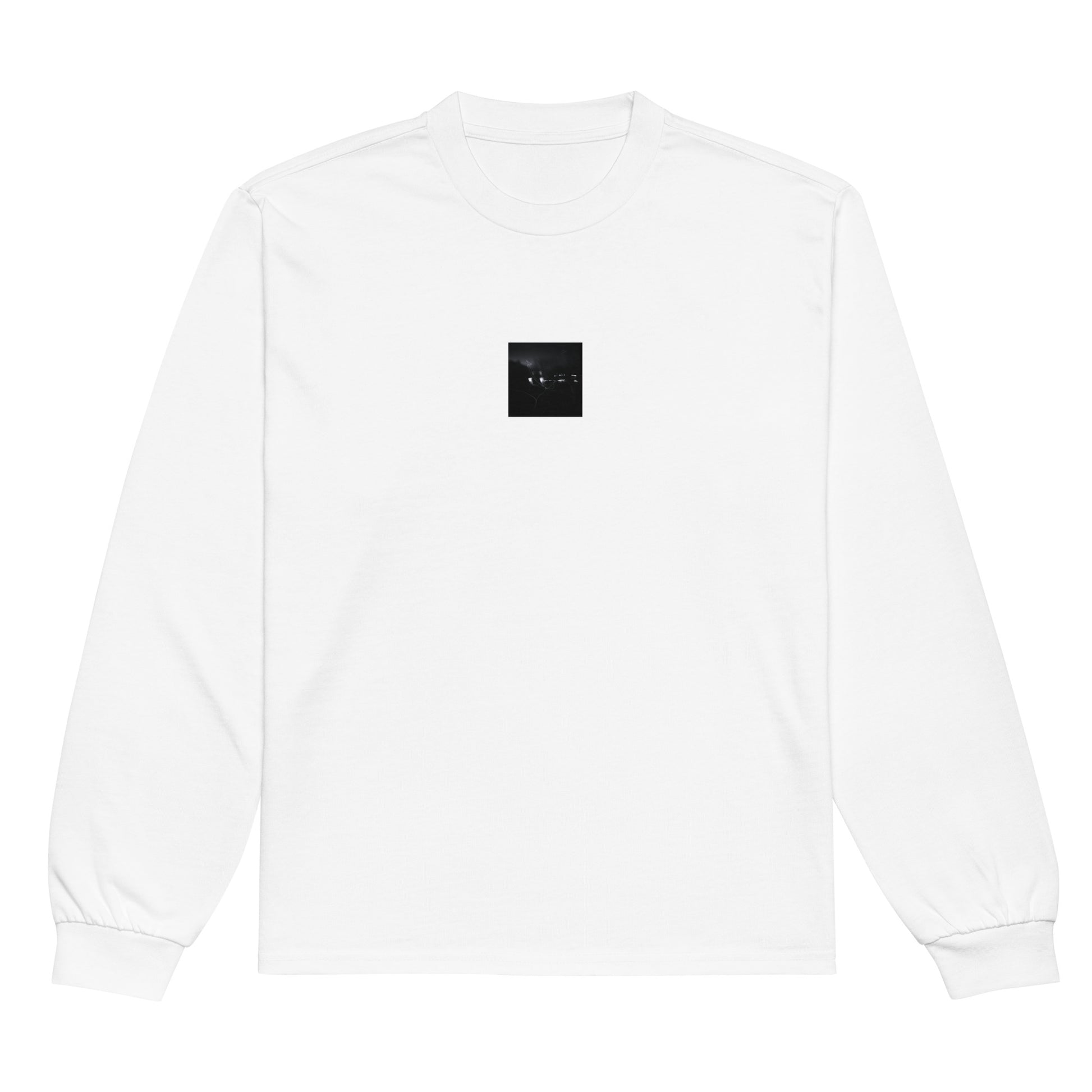 Minimalist streetwear style unisex premium heavyweight long sleeve shirt in white, featuring a 'Night Light (B&W)' photograph print. / Night Light (B&W) プレミアム・ヘビーウェイト長袖Tシャツ（ホワイト）：清潔感のある白地に、夜の光のモノクロ風景デザインが際立つ長袖Tシャツ。