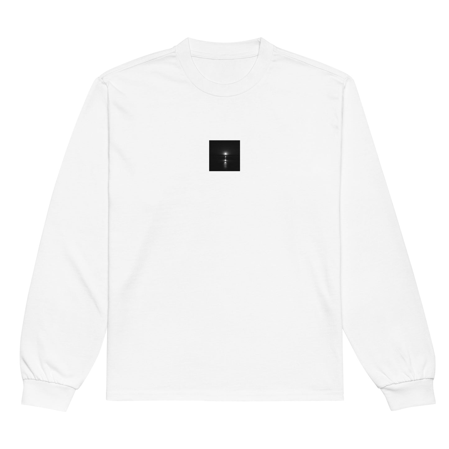 Minimalist streetwear style premium long sleeve shirt in white, featuring the 'Ocean Sunbeams (B&W)' photograph. / 「Ocean Sunbeams (B&W)」ロングスリーブTシャツ（ホワイト）：クリーンな白地に海面の光をモノクロで描いた、モードストリートスタイルの定番。