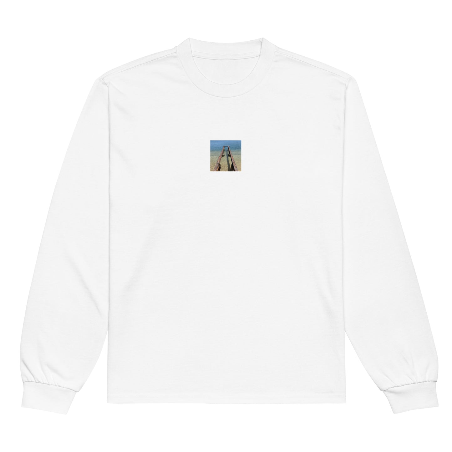 Minimalist streetwear style premium heavyweight long sleeve shirt in white featuring the 'Sea and Pier' photo art on the front. / モードストリート系プレミアム・ヘビーウェイト長袖Tシャツ（ホワイト）フロントに「海と桟橋」のフォトアートを配したデザイン。
