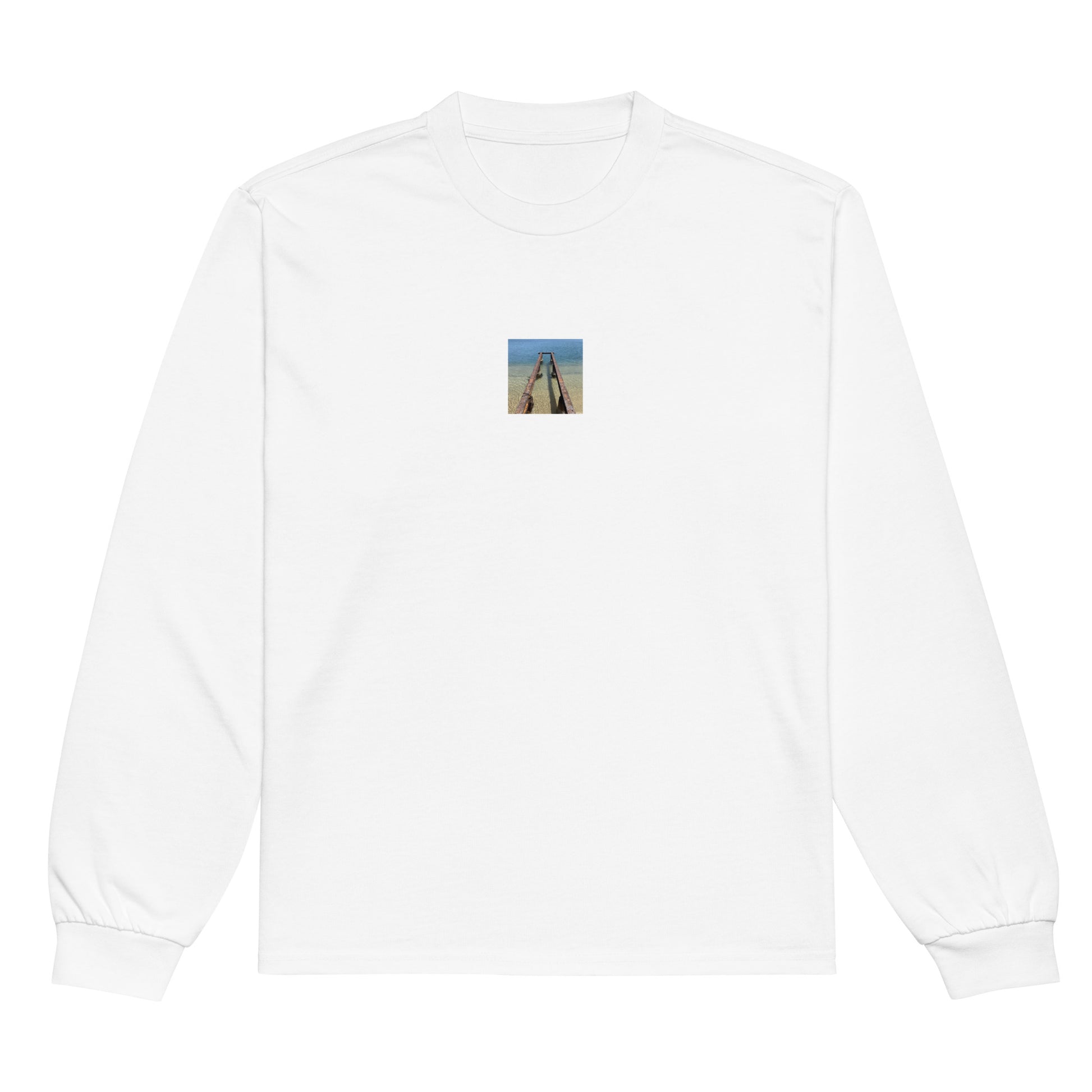 Minimalist streetwear style premium heavyweight long sleeve shirt in white featuring the 'Sea and Pier' photo art on the front. / モードストリート系プレミアム・ヘビーウェイト長袖Tシャツ（ホワイト）フロントに「海と桟橋」のフォトアートを配したデザイン。