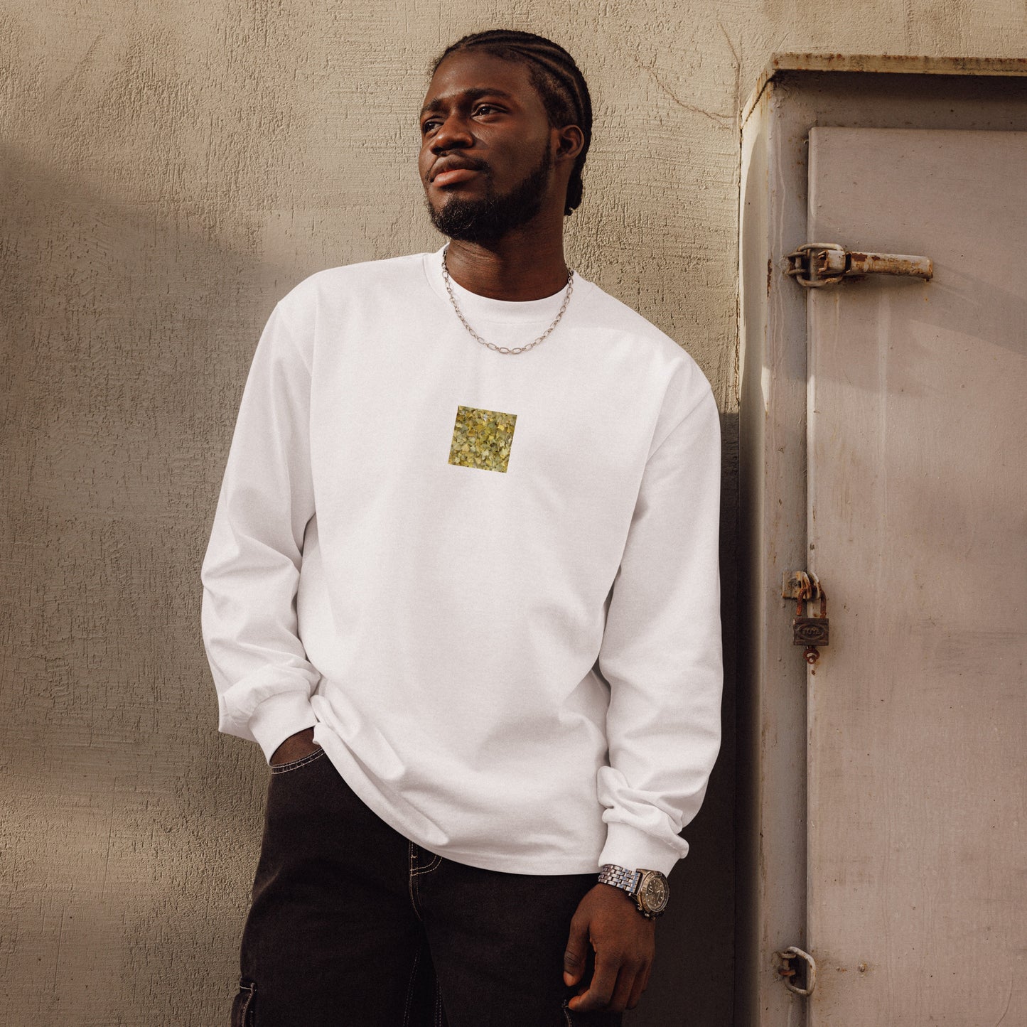 Minimalist streetwear style premium heavyweight long sleeve shirt in white featuring the 'Ginkgo Fallen Leaves' photo art on the front. / モードストリート系プレミアム・ヘビーウェイト長袖Tシャツ（ホワイト）フロントに「イチョウの落ち葉」のフォトアートを配したデザイン。