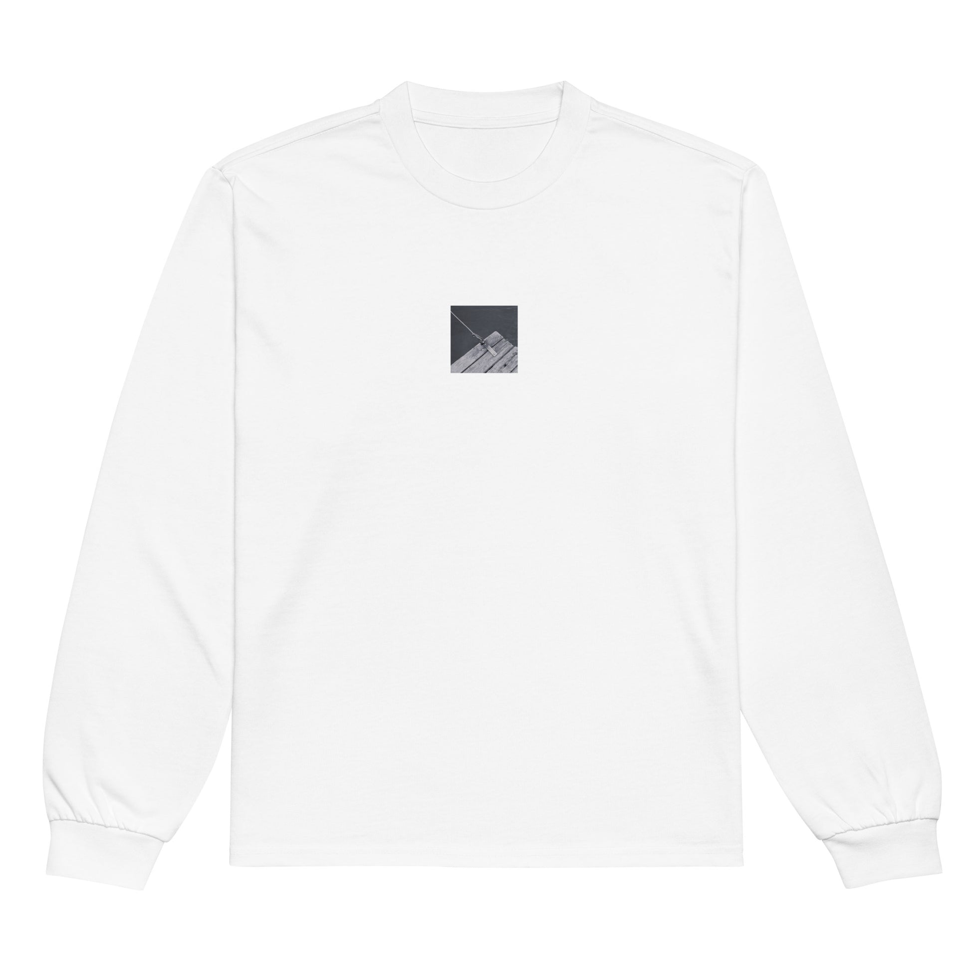 Minimalist streetwear style premium heavyweight long sleeve shirt in white featuring the 'Ocean Pier (B&W)' photo art on the front. / モードストリート系プレミアム・ヘビーウェイト長袖Tシャツ（ホワイト）フロントに「海の桟橋 (モノクロ)」のフォトアートを配したデザイン。