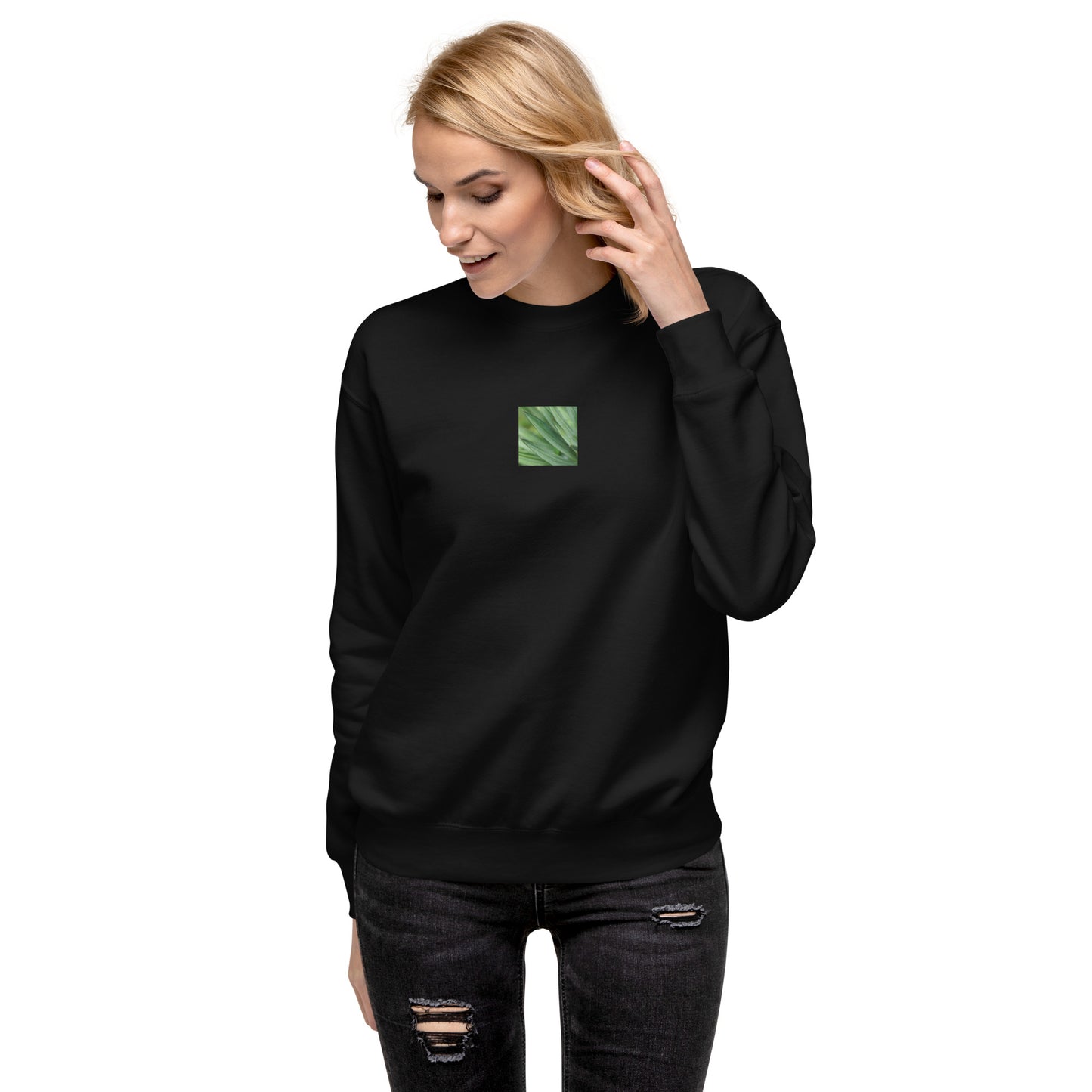 Minimalist streetwear style unisex premium sweatshirt in black, featuring a vibrant Yucca plant color photograph on the chest. A modern, monochromatic staple with a comfortable fleece interior. / モードストリート系ユニセックス・ブラック・プレミアムスウェット。フロントにユッカ植物のカラー写真プリント。内側は暖かなフリース素材。