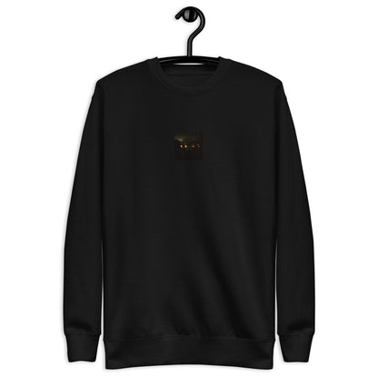 Minimalist streetwear style unisex premium sweatshirt in black, featuring a 'Night Light' photograph print on the chest. / Night Light プレミアム・スウェット（ブラック）：夜の光の幻想的な風景を捉えた写真が際立つ、モードストリート系ミニマリスト・スウェット。