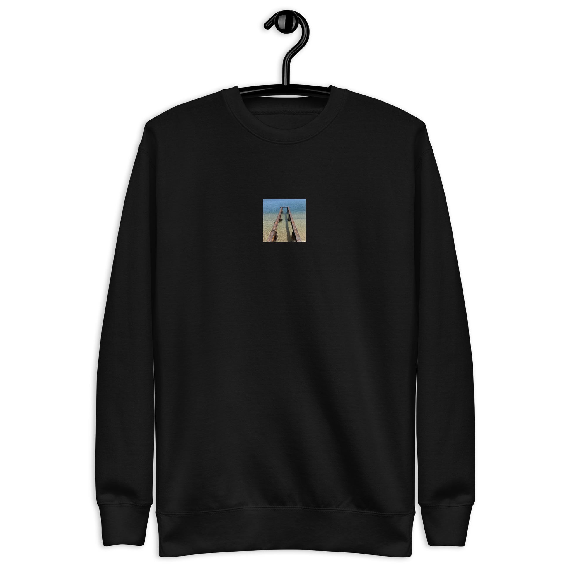 Minimalist streetwear style unisex premium sweatshirt in black featuring the 'Sea and Pier' photo art on the front. / モードストリート系ユニセックス・プレミアム・スウェットシャツ（ブラック）フロントに「海と桟橋」のフォトアートを配したデザイン。