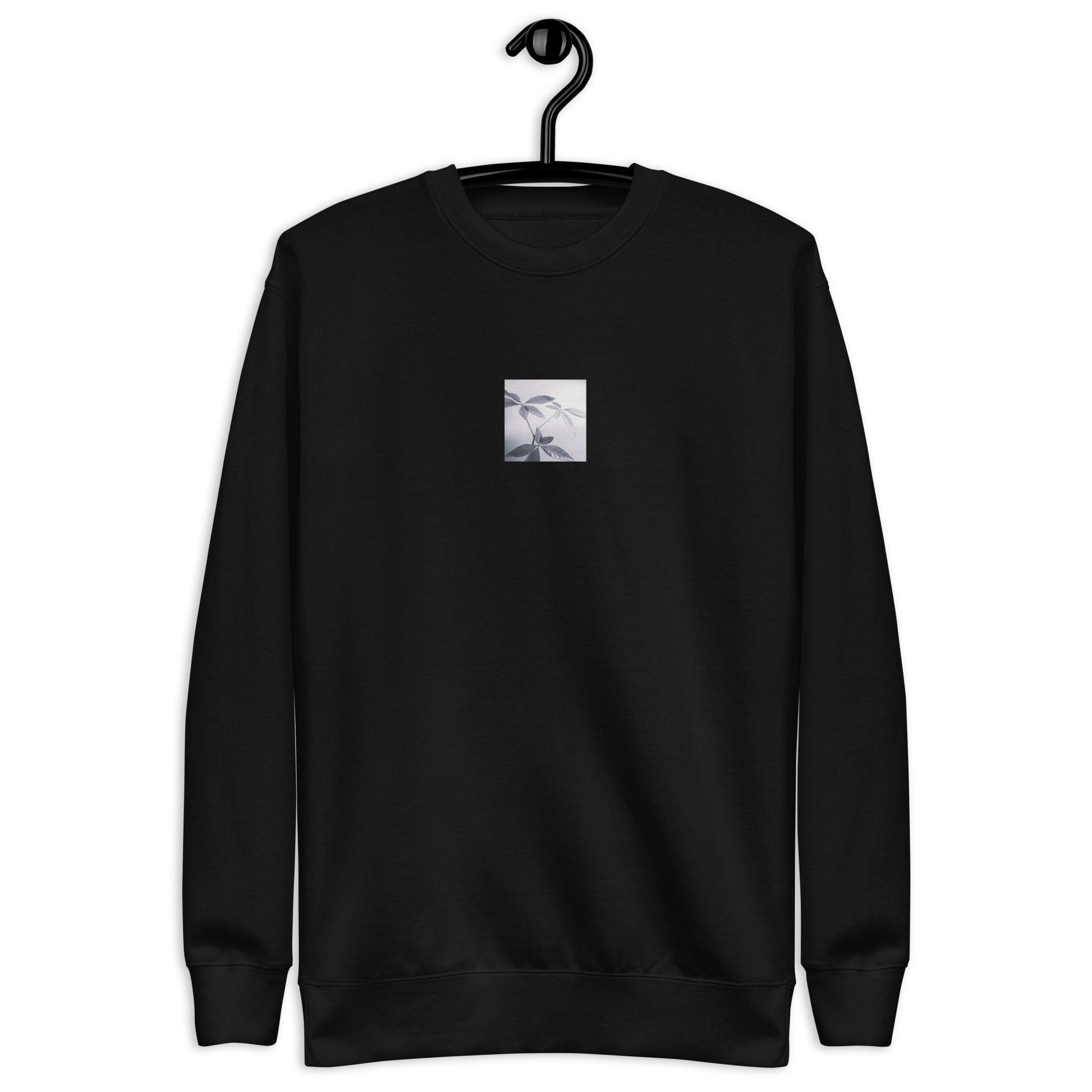Minimalist streetwear style unisex premium sweatshirt in black featuring the 'Botanical (B&W)' photo art on the front. / モードストリート系ユニセックス・プレミアム・スウェットシャツ（ブラック）フロントに「ボタニカル (モノクロ)」のフォトアートを配したデザイン。