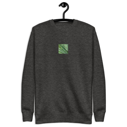 Minimalist streetwear style unisex premium sweatshirt in charcoal heather, featuring a vibrant Yucca plant color photograph on the chest. A versatile, sophisticated piece for everyday wear. / モードストリート系ユニセックス・チャコールヘザー・プレミアムスウェット。フロントにユッカ植物のカラー写真プリント。デイリーユースに最適な洗練された色合い。