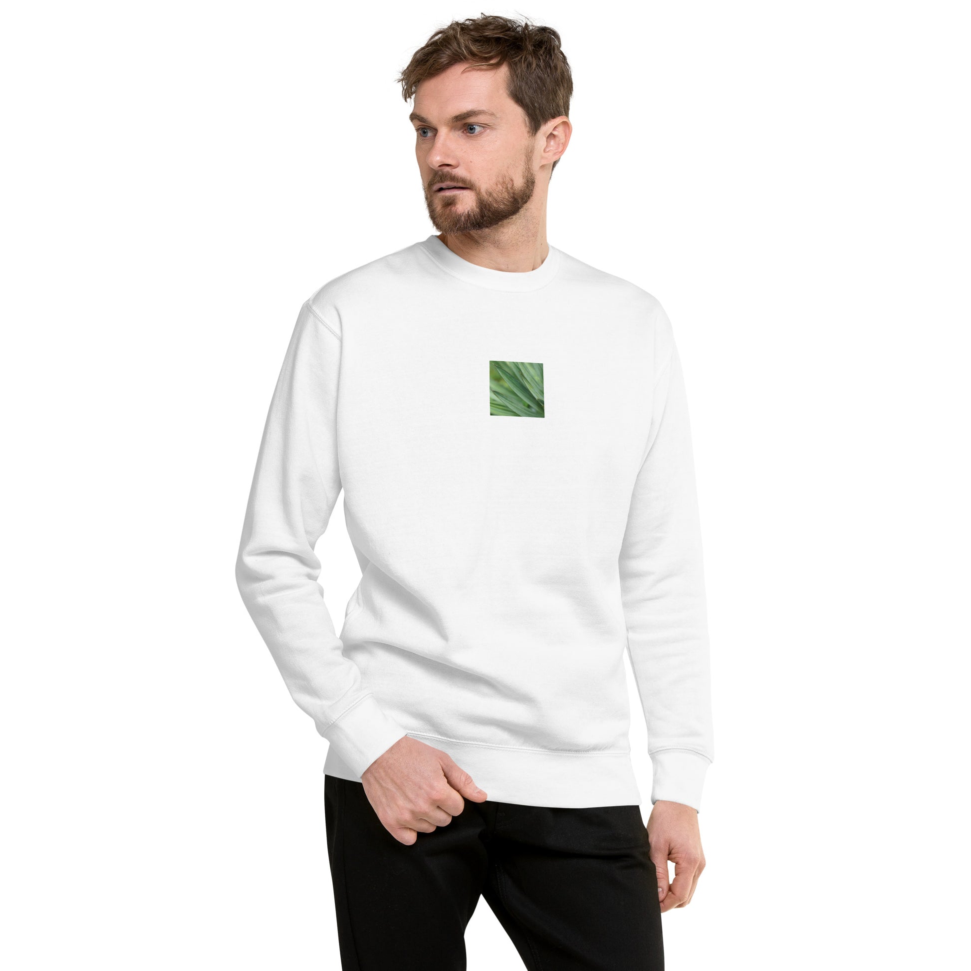 Minimalist streetwear style unisex premium sweatshirt in white, featuring a vibrant Yucca plant color photograph on the chest. A crisp, clean essential for modern styling. / モードストリート系ユニセックス・ホワイト・プレミアムスウェット。フロントにユッカ植物のカラー写真プリント。清潔感のあるモダンなデザイン。