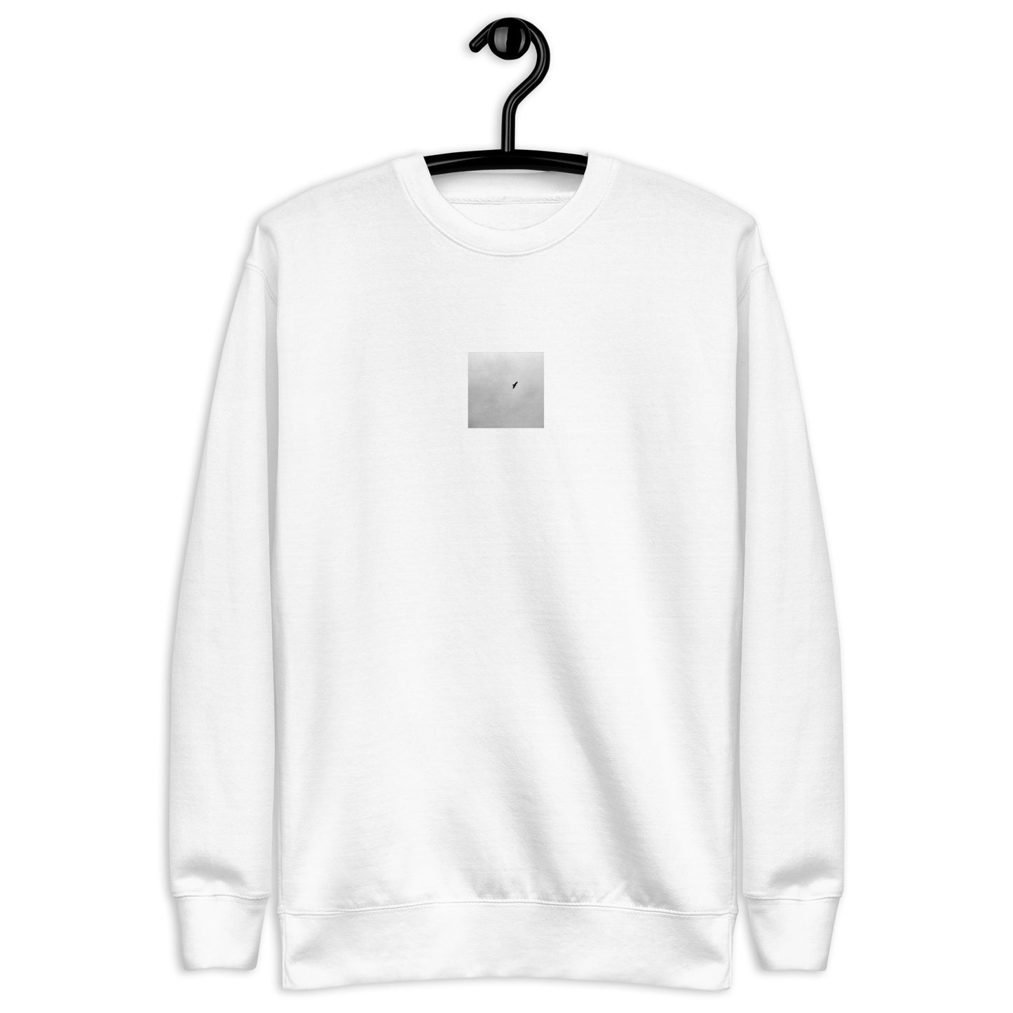 Minimalist streetwear style unisex premium sweatshirt in white, featuring a 'Bird and Sky (B&W)' photograph print on the chest. / Bird and Sky (B&W) プレミアム・スウェット（ホワイト）：清潔感のある白地に、空を飛ぶ鳥のモノクロデザインが際立つモードストリート系スウェット。