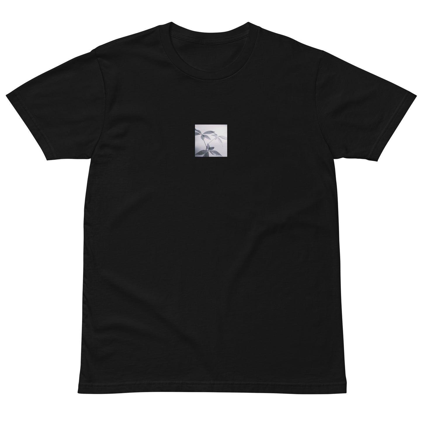 Minimalist streetwear style premium T-shirt in black featuring the 'Botanical (B&W)' photo art on the front. / モードストリート系プレミアムTシャツ（ブラック）フロントに「ボタニカル (モノクロ)」のフォトアートを配したデザイン。