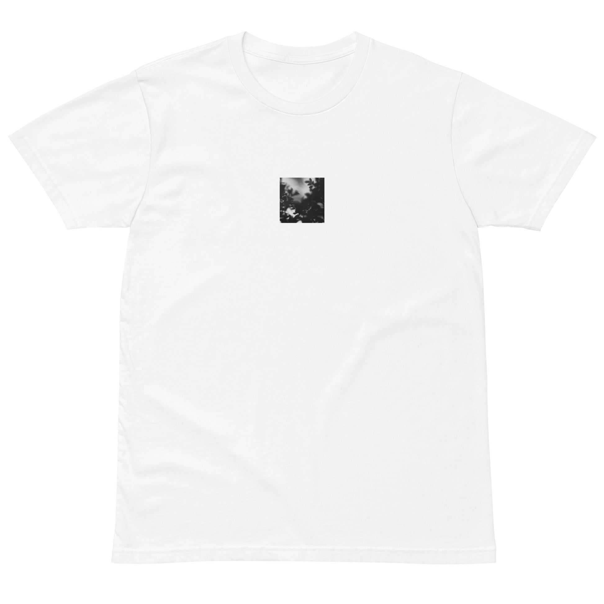 Minimalist streetwear style unisex premium T-shirt in white, featuring a 'Tree Branches' black and white photograph print on the chest. A crisp, high-quality essential with a modern, artistic edge. / モードストリート系ユニセックス・ホワイト・プレミアムTシャツ。フロントに「Tree Branches」モノクロ写真プリントを配置。清潔感のある白地に写真が映える、モダンでアーティスティックなミニマリスト・ストリートウェア。