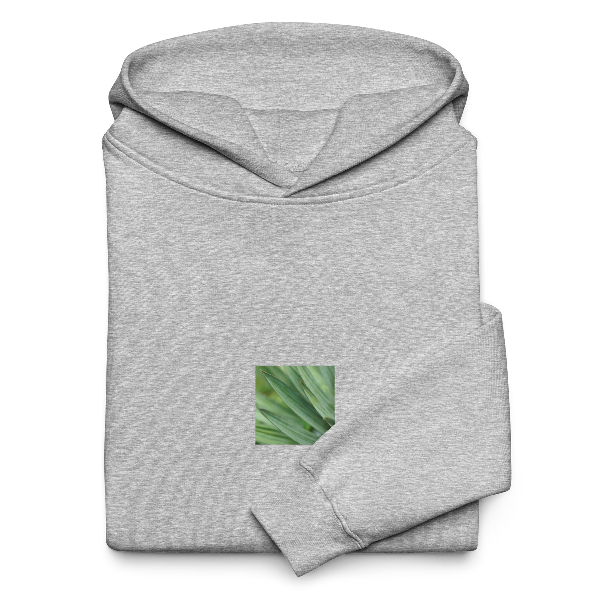 Minimalist streetwear style unisex oversized hoodie in athletic heather, featuring a vibrant Yucca plant color photograph on the chest. A clean, sophisticated aesthetic with a comfortable, relaxed fit. / モードストリート系ユニセックス・アスレチックヘザー（グレー）・オーバーサイズフーディー。フロントにユッカ植物のカラー写真プリント。都会的で洗練されたミニマリスト・ストリートウェア。