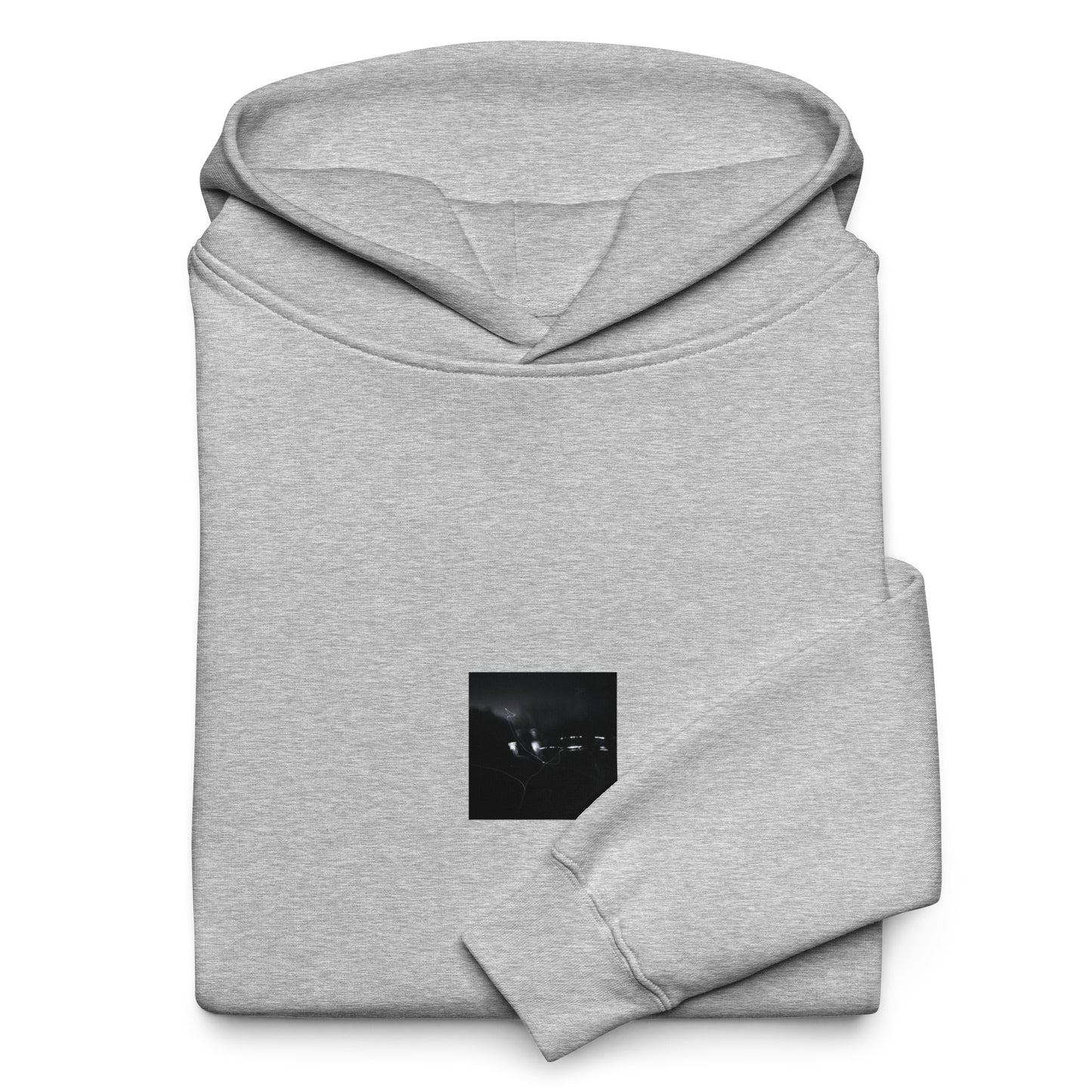 Minimalist streetwear style unisex oversized hoodie in athletic heather, featuring a 'Night Light (B&W)' photograph print on the chest. / Night Light (B&W) オーバーサイズ・フーディー（アスレチックヘザー）：都会的な杢グレーに夜の光のモノクロ風景が馴染む、モードストリートのためのモダンなパーカー。