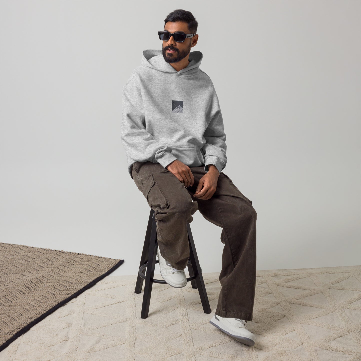 Minimalist streetwear style oversized hoodie in athletic heather featuring the 'Ocean Pier (B&W)' photo art on the front. / モードストリート系オーバーサイズフーディー（アスレチックヘザー）フロントに「海の桟橋 (モノクロ)」のフォトアートを配したデザイン。