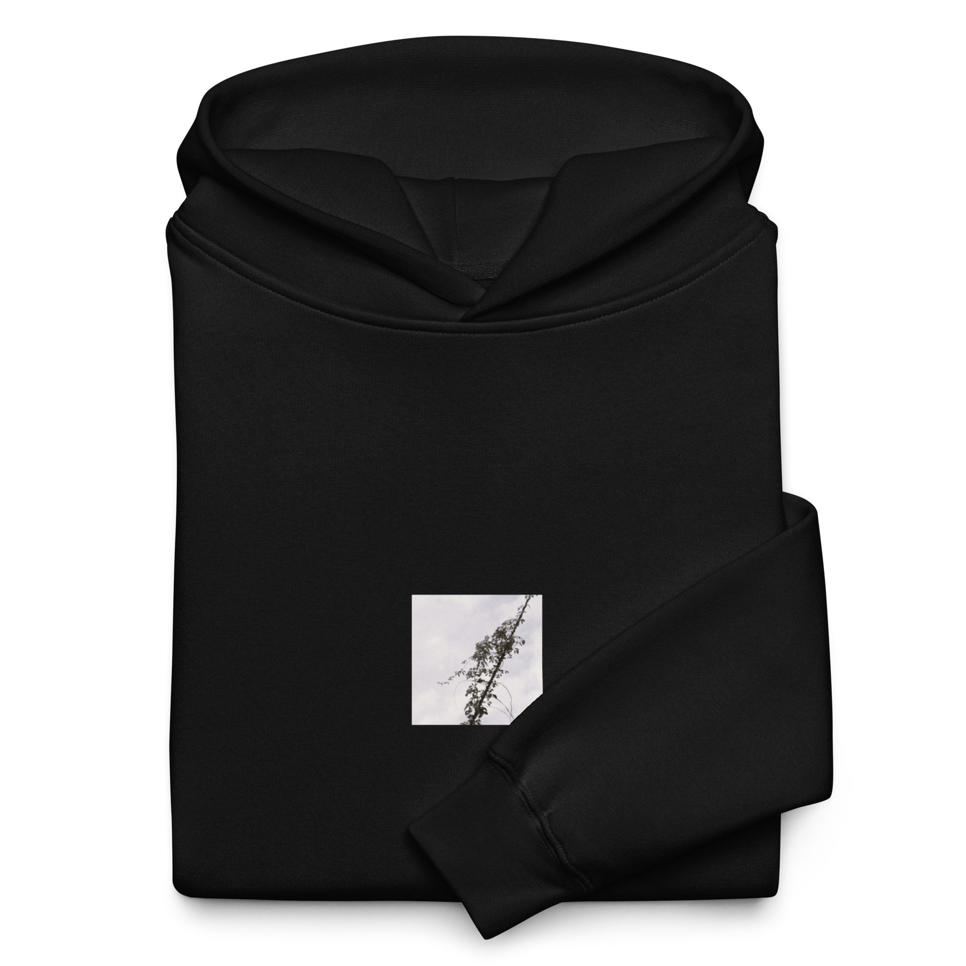 Minimalist mode style unisex premium black oversized hoodie with a 'Vines Entangled on a Utility Pole' black and white photo print / モードストリート系ユニセックス・プレミアム・オーバーサイズパーカー（ブラック）、フロントに「電柱に絡まるツル」のモノクロ写真プリント（パーカー）