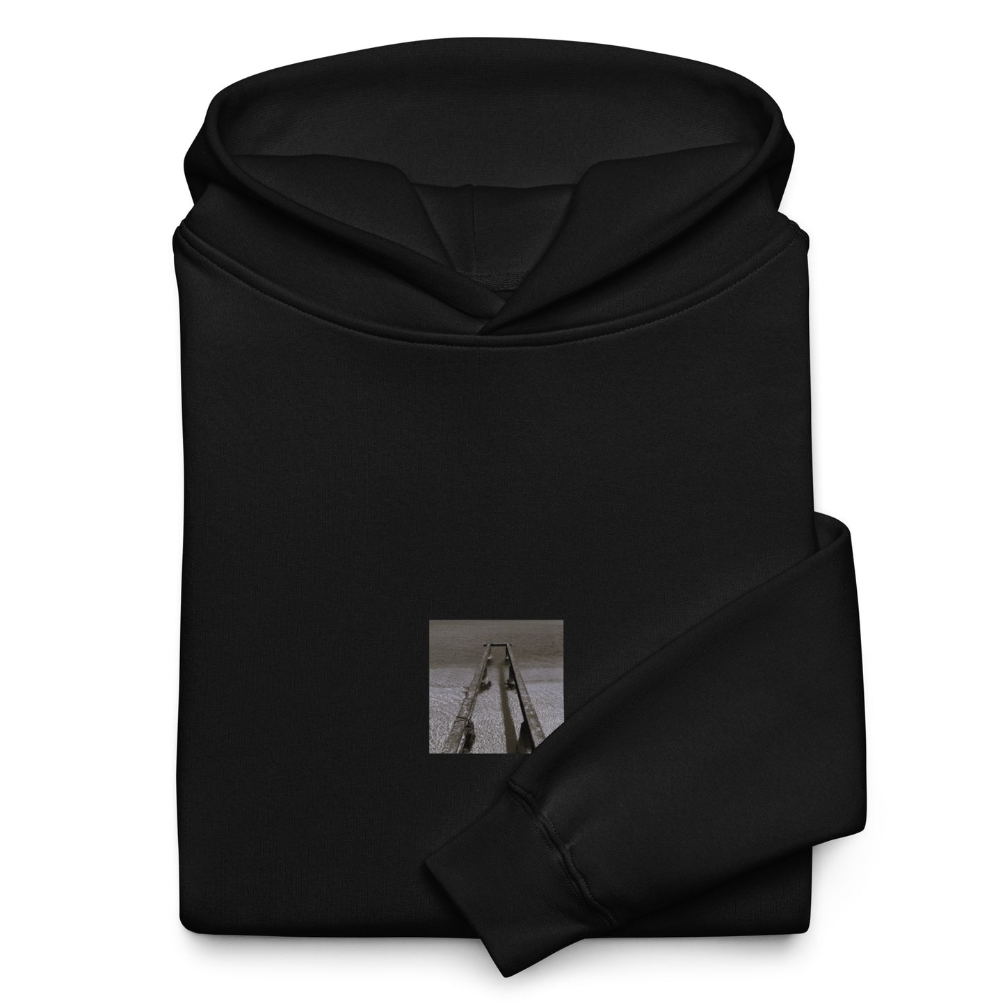 Minimalist streetwear style oversized hoodie in black featuring the 'Sea and Pier (B&W)' photo art on the front. / モードストリート系オーバーサイズフーディー（ブラック）フロントに「海と桟橋（モノクロ）」のフォトアートを配したデザイン。