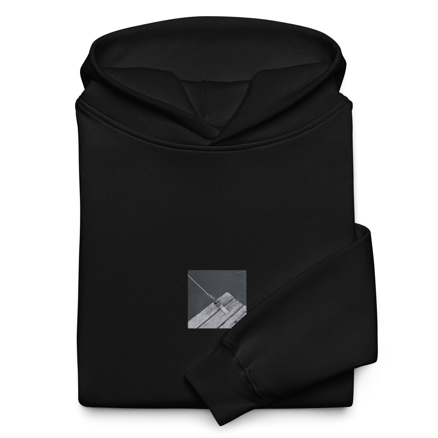 Minimalist streetwear style oversized hoodie in black featuring the 'Ocean Pier (B&W)' photo art on the front. / モードストリート系オーバーサイズフーディー（ブラック）フロントに「海の桟橋 (モノクロ)」のフォトアートを配したデザイン。