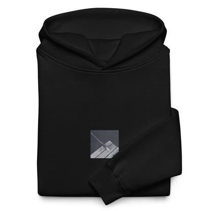 Minimalist streetwear style oversized hoodie in black featuring the 'Ocean Pier (B&W)' photo art on the front. / モードストリート系オーバーサイズフーディー（ブラック）フロントに「海の桟橋 (モノクロ)」のフォトアートを配したデザイン。