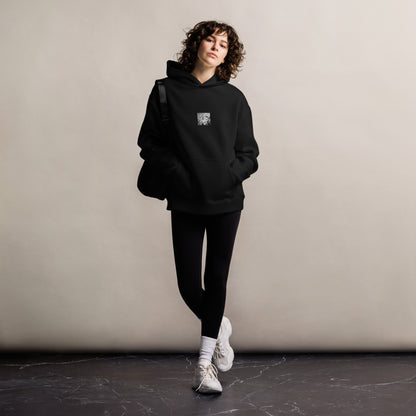 Minimalist streetwear style oversized hoodie in black featuring the 'Ginkgo Biloba (B&W)' photo art on the front. / モードストリート系オーバーサイズフーディー（ブラック）フロントに「イチョウ (モノクロ)」のフォトアートを配したデザイン。