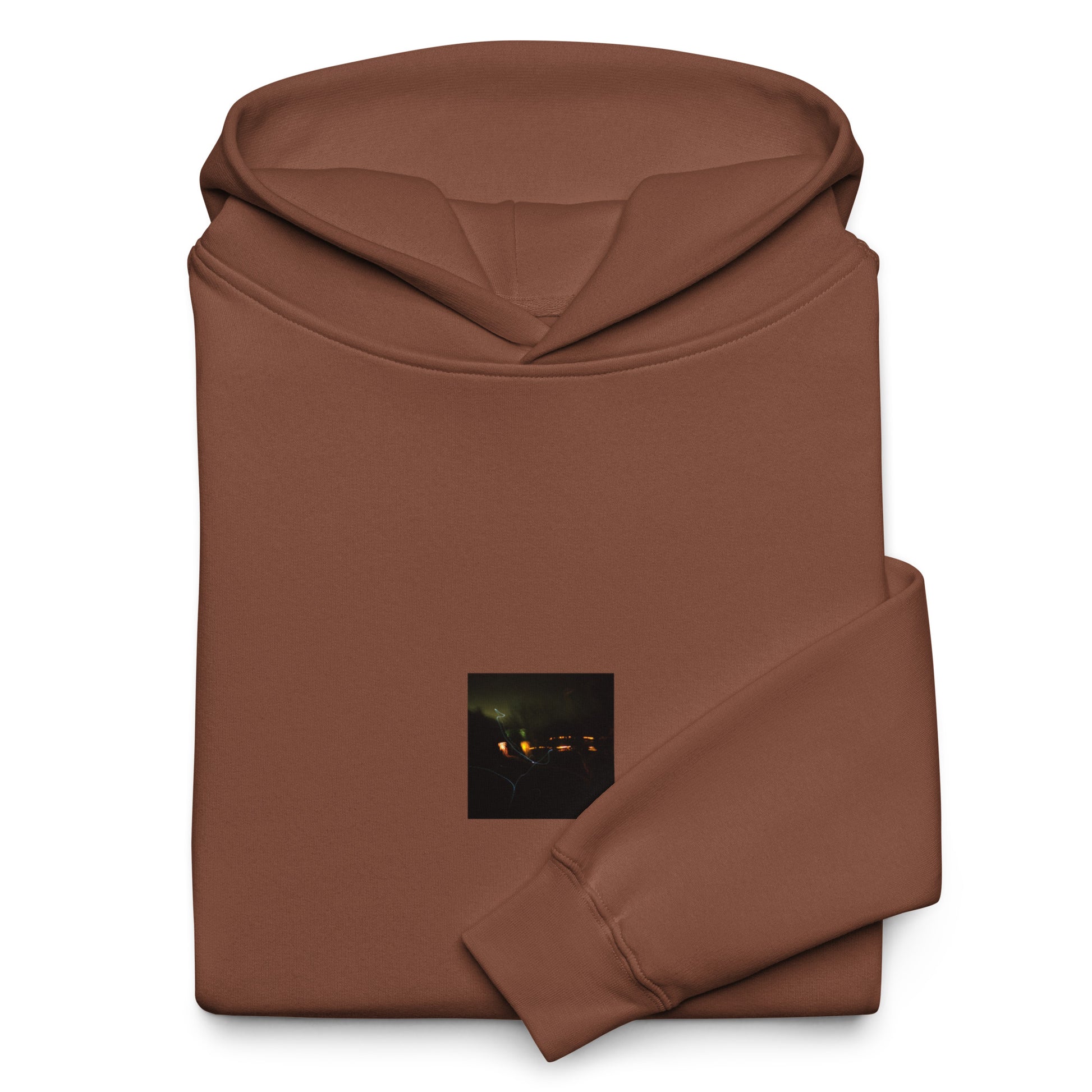 Minimalist streetwear style unisex oversized hoodie in chestnut, featuring a 'Night Light' photograph print on the chest. / Night Light オーバーサイズ・フーディー（チェスナット）：落ち着いたブラウンに夜の光の風景写真が映える、モダンでミニマルなモードストリート系パーカー。